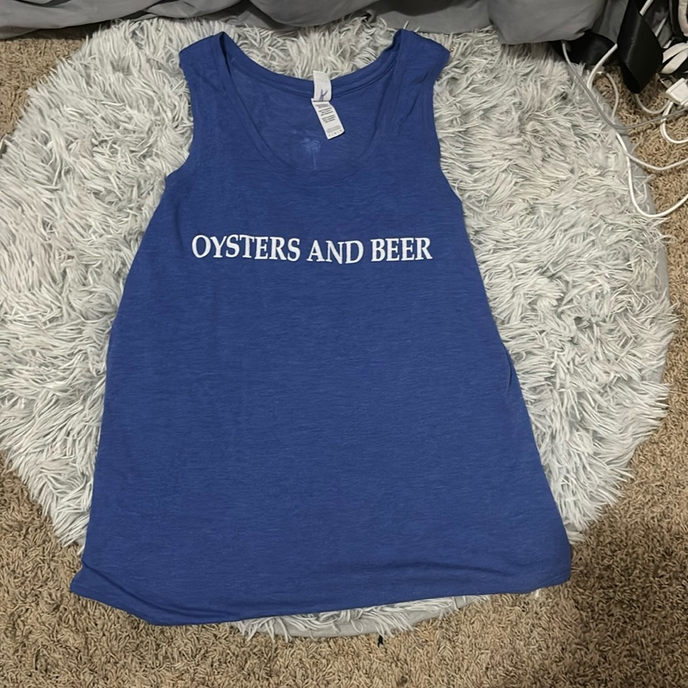 I am selling a blue tank top. Worn a couple of times.